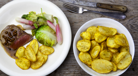 Entrecôte met roze peper en gestoofde groenten